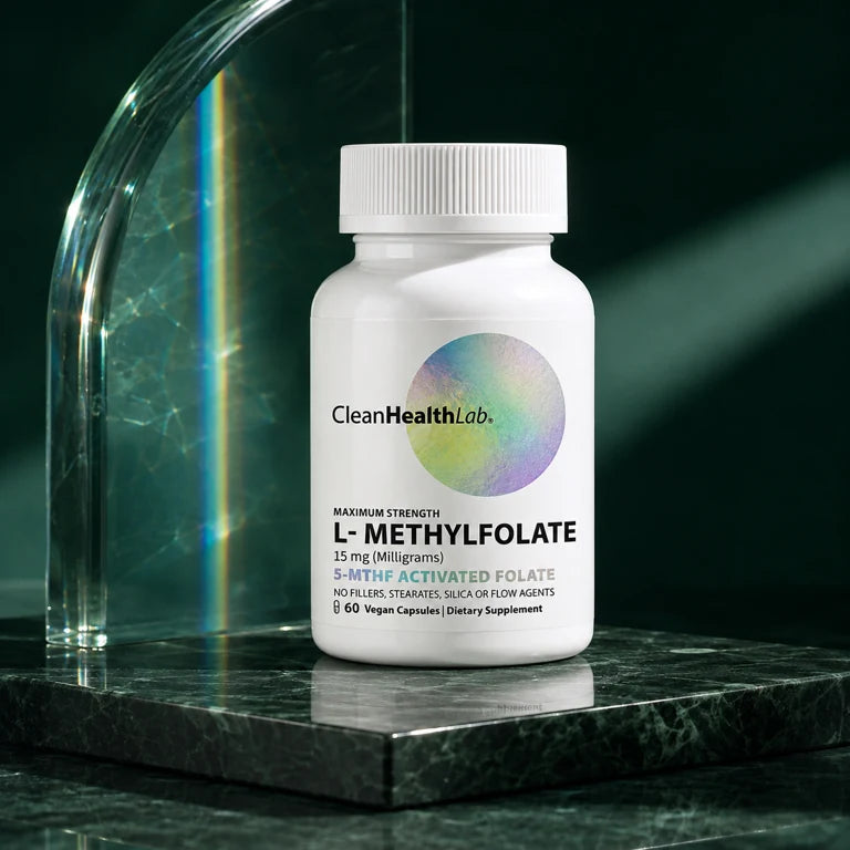 CleanHealthLab Maximum Strength L-Methylfolate, 60 vegan capsules, on an emerald stone plinth